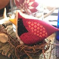Red Bird by Amy Bruecken Designs and a Bee Adam Prefinished Original